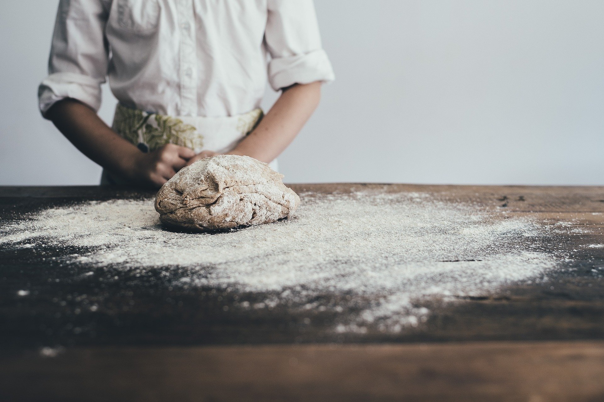 A baker preparing bread
