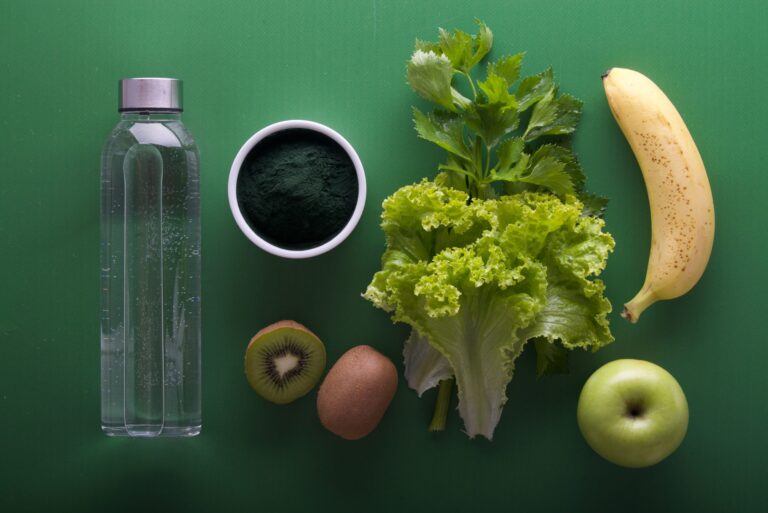 Organised picture of banana, apple, kiwi, and lettuce leaf