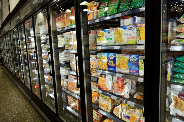 the frozen food aisle in the grocery store