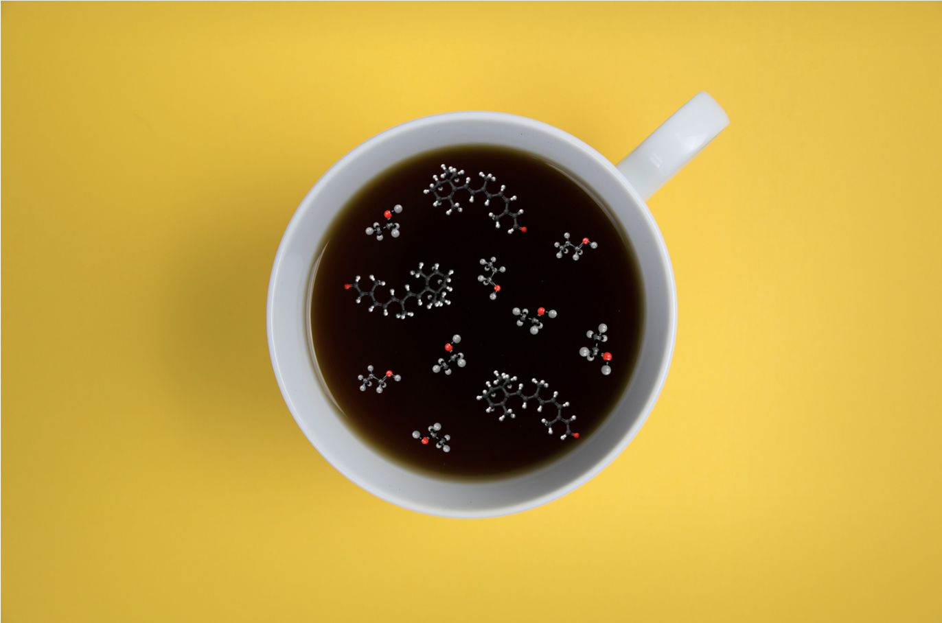 cup of coffee with molecules in the liquid