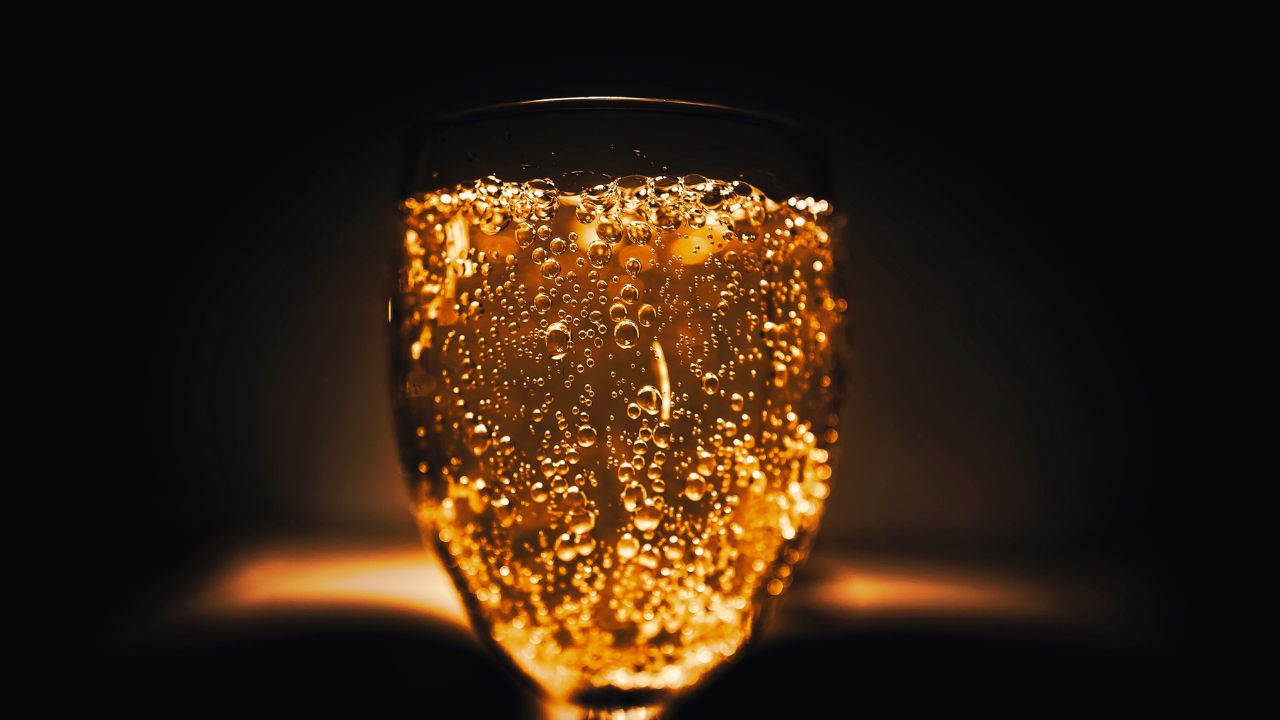 Close up of a glass of Champagne with bubbles rising